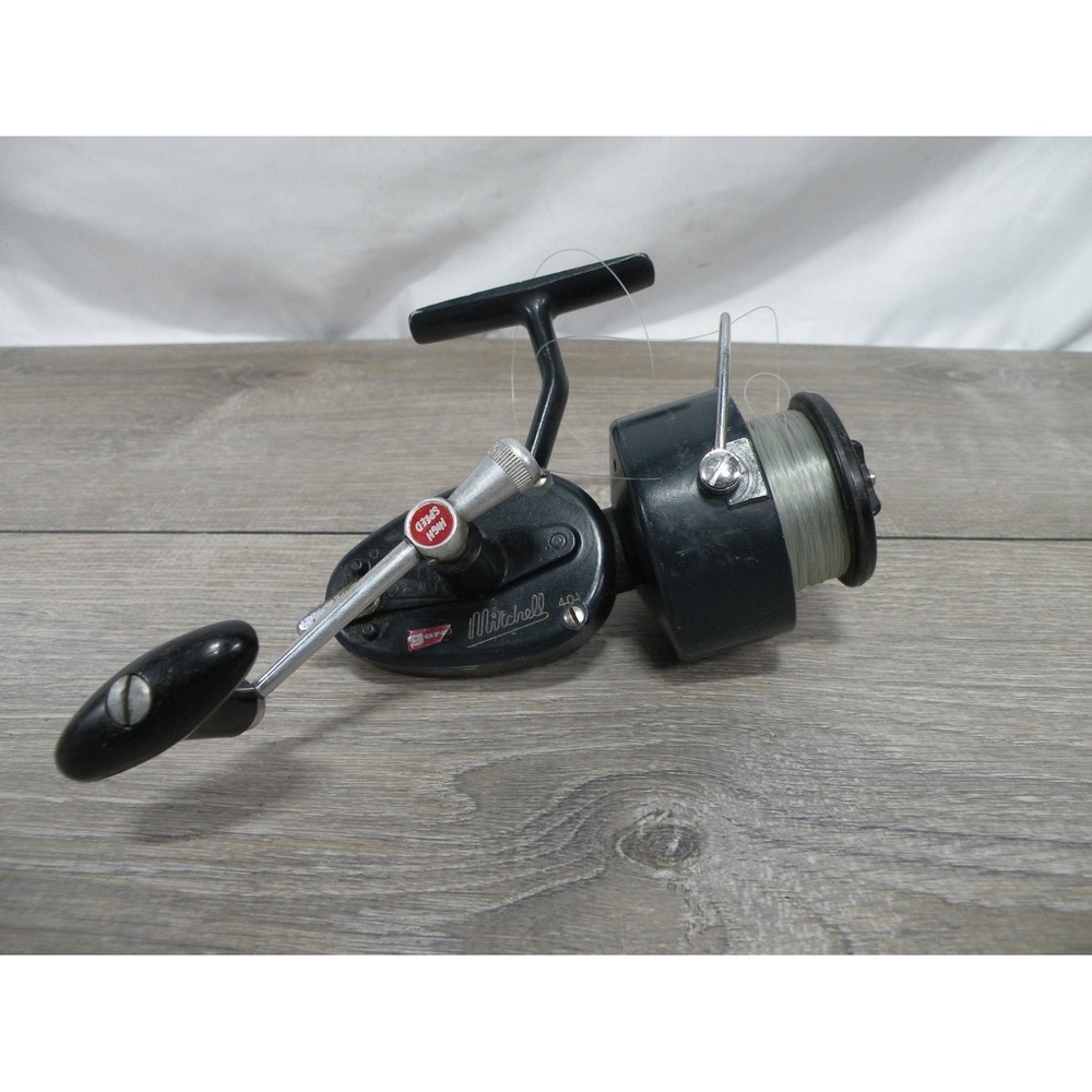 Mitchell 401 Spinning Reel Black and Metal Manual Crank Handle Bail Arm Side